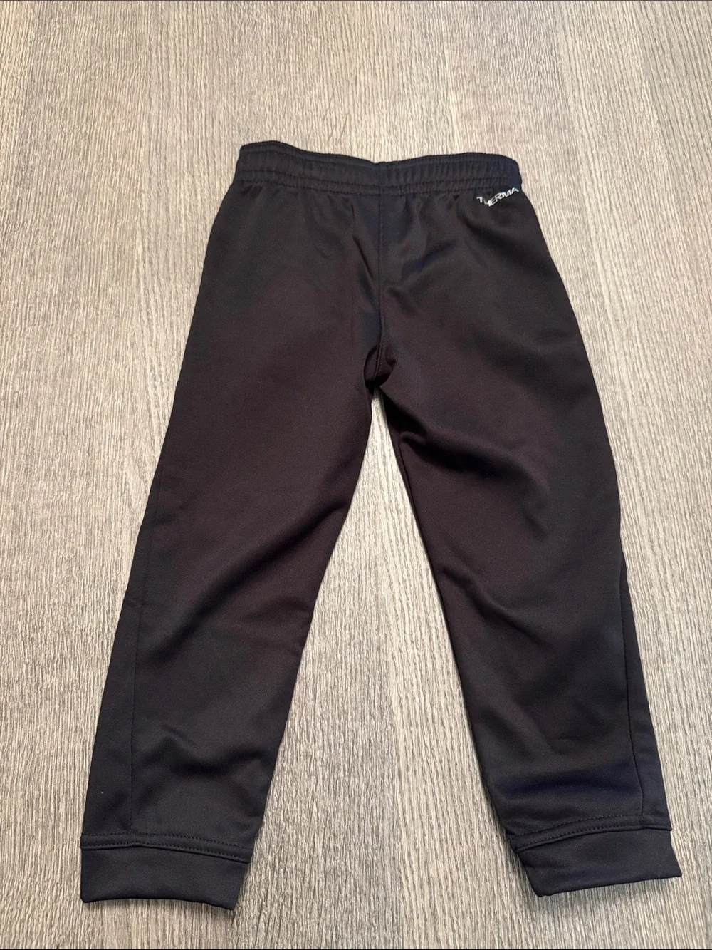 Nike Black Kids Sweatpants with White Swoosh Graphic